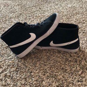 Black and white nike high tops